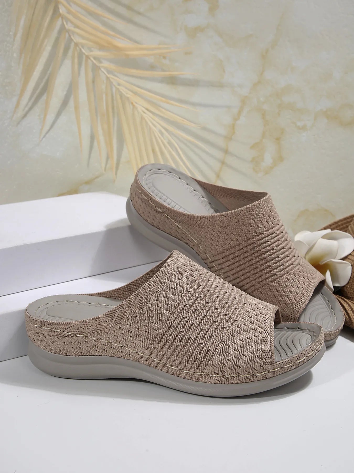 Breathable mesh open toe flat sandals.