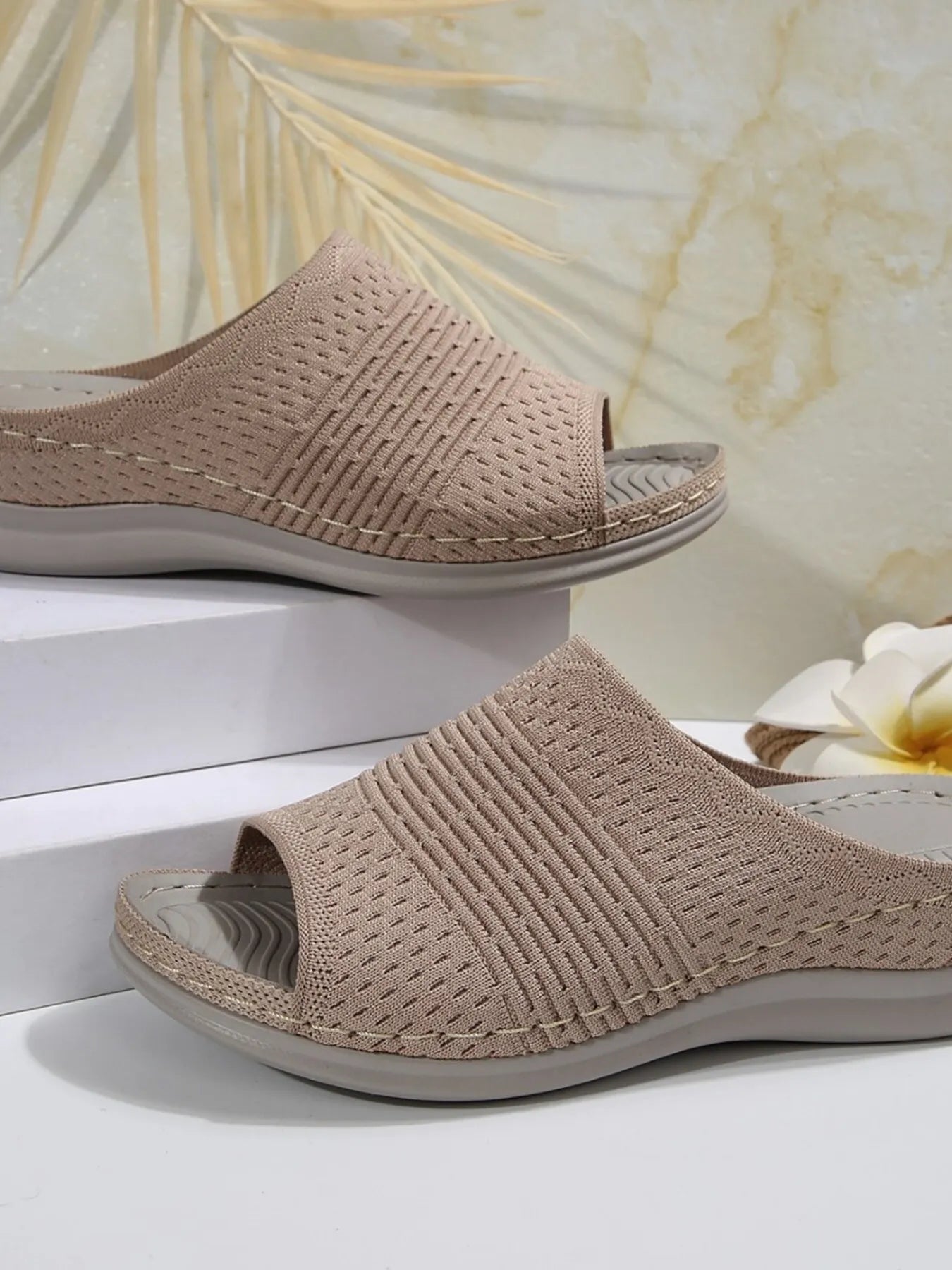 Breathable mesh open toe flat sandals.
