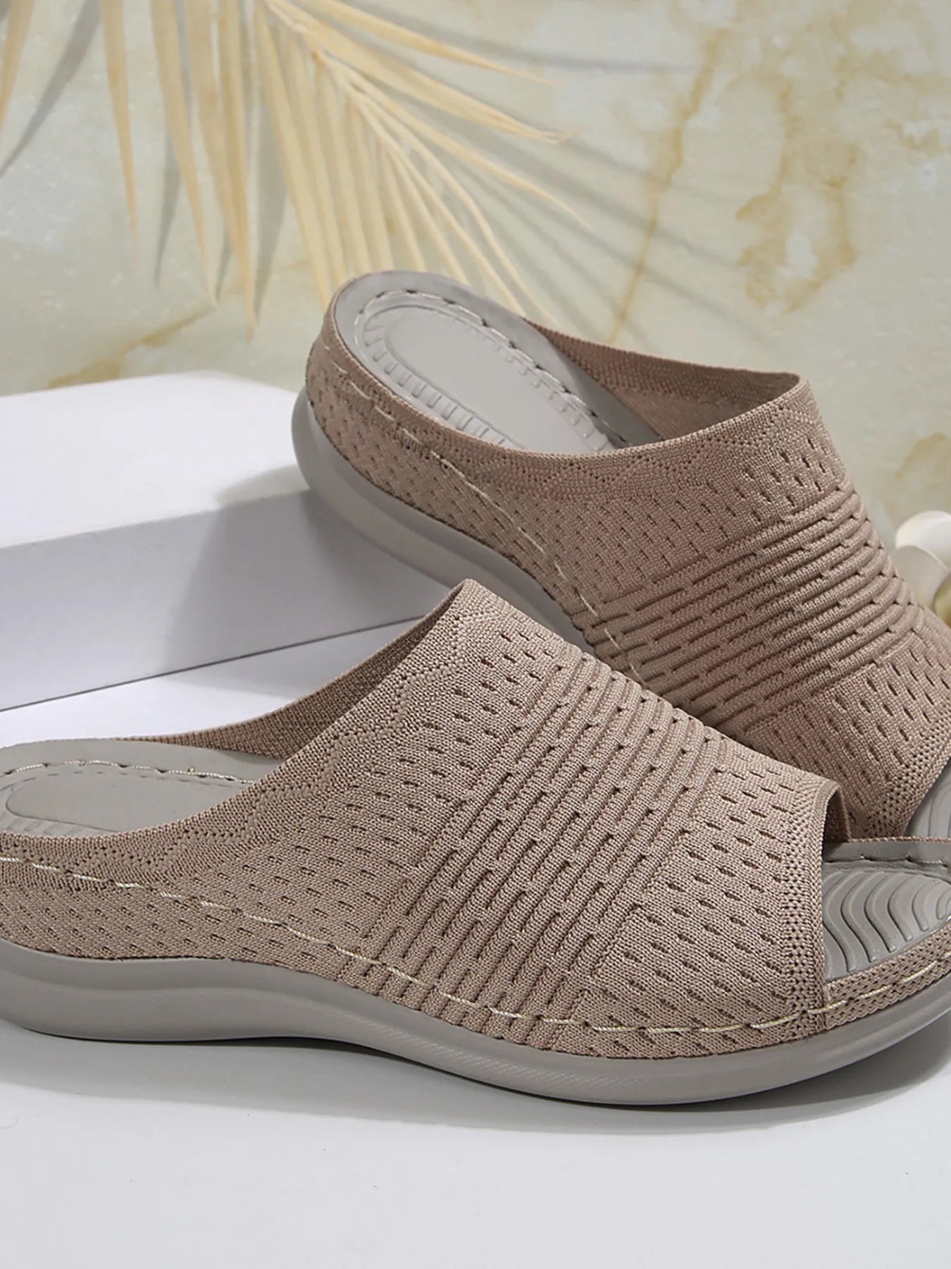 Breathable mesh open toe flat sandals.