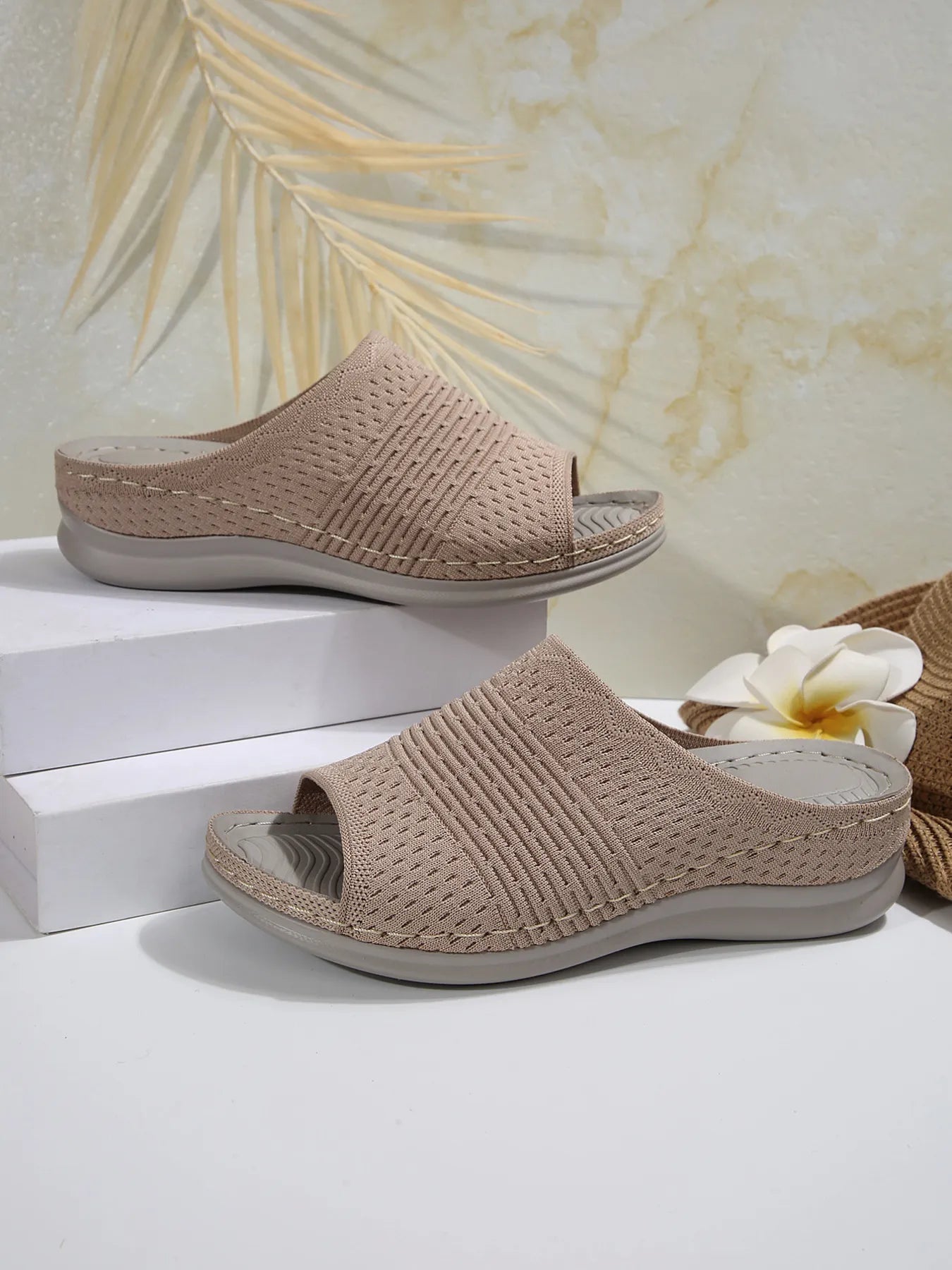 Breathable mesh open toe flat sandals.