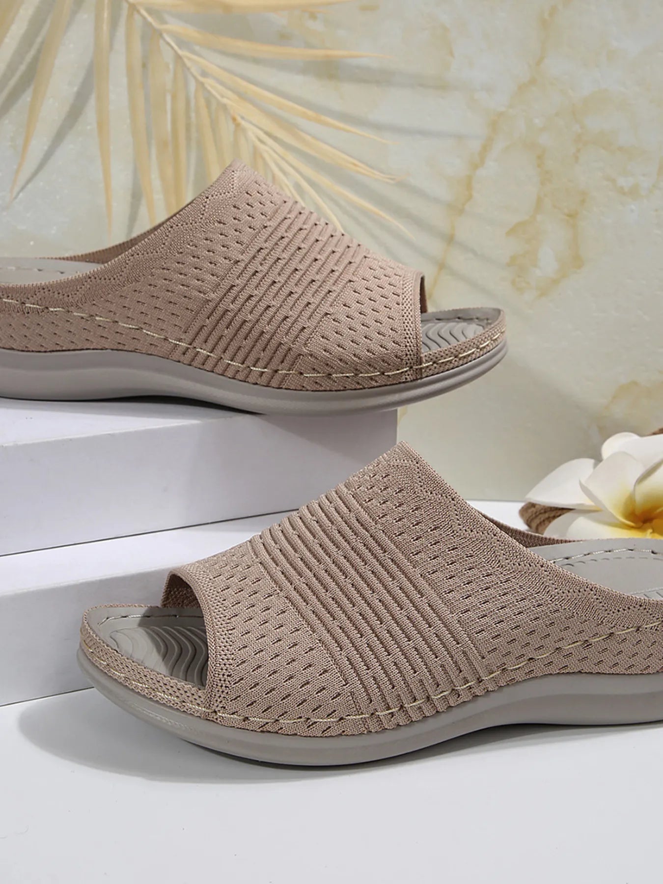 Breathable mesh open toe flat sandals.