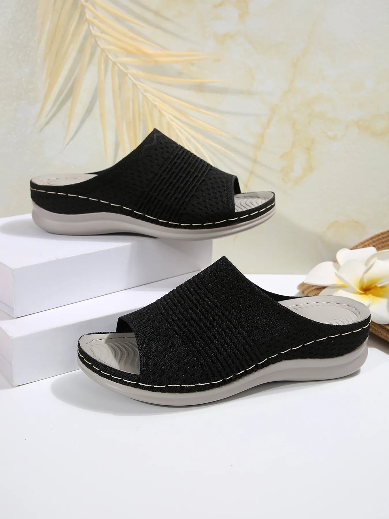 Breathable mesh open toe flat sandals.