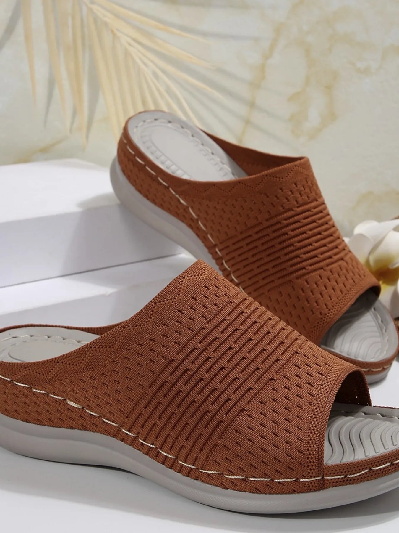 Breathable mesh open toe flat sandals.