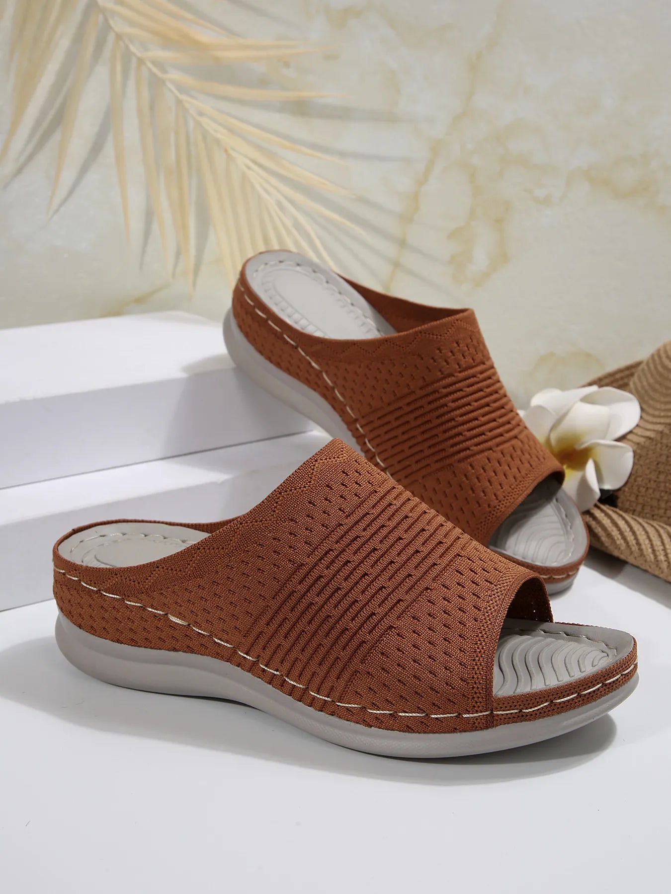 Breathable mesh open toe flat sandals.