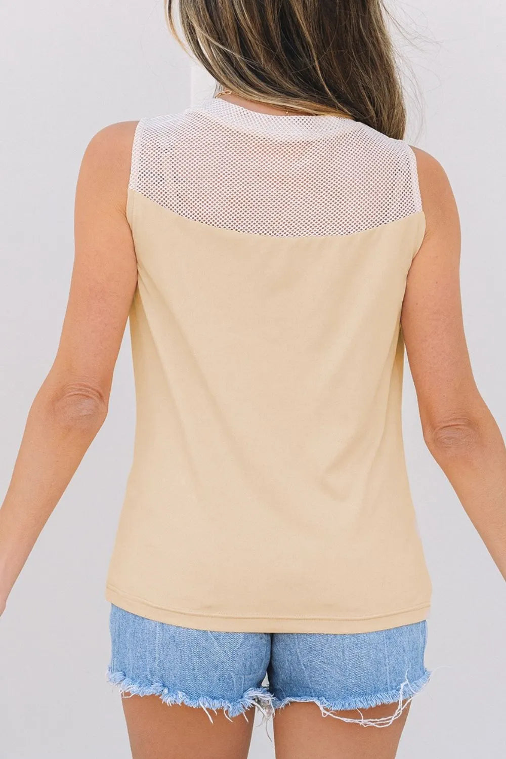 Mesh patchwork crew neck tank top.