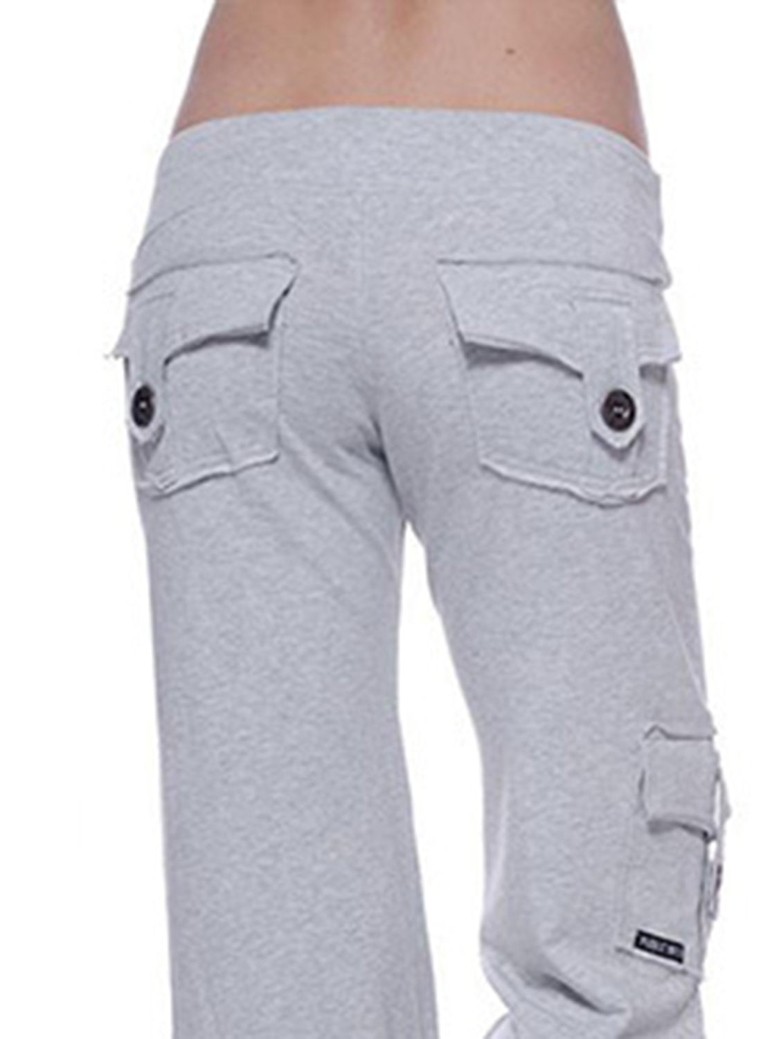 Mid waist pants with drawstring, buttons, and pockets, opaque.