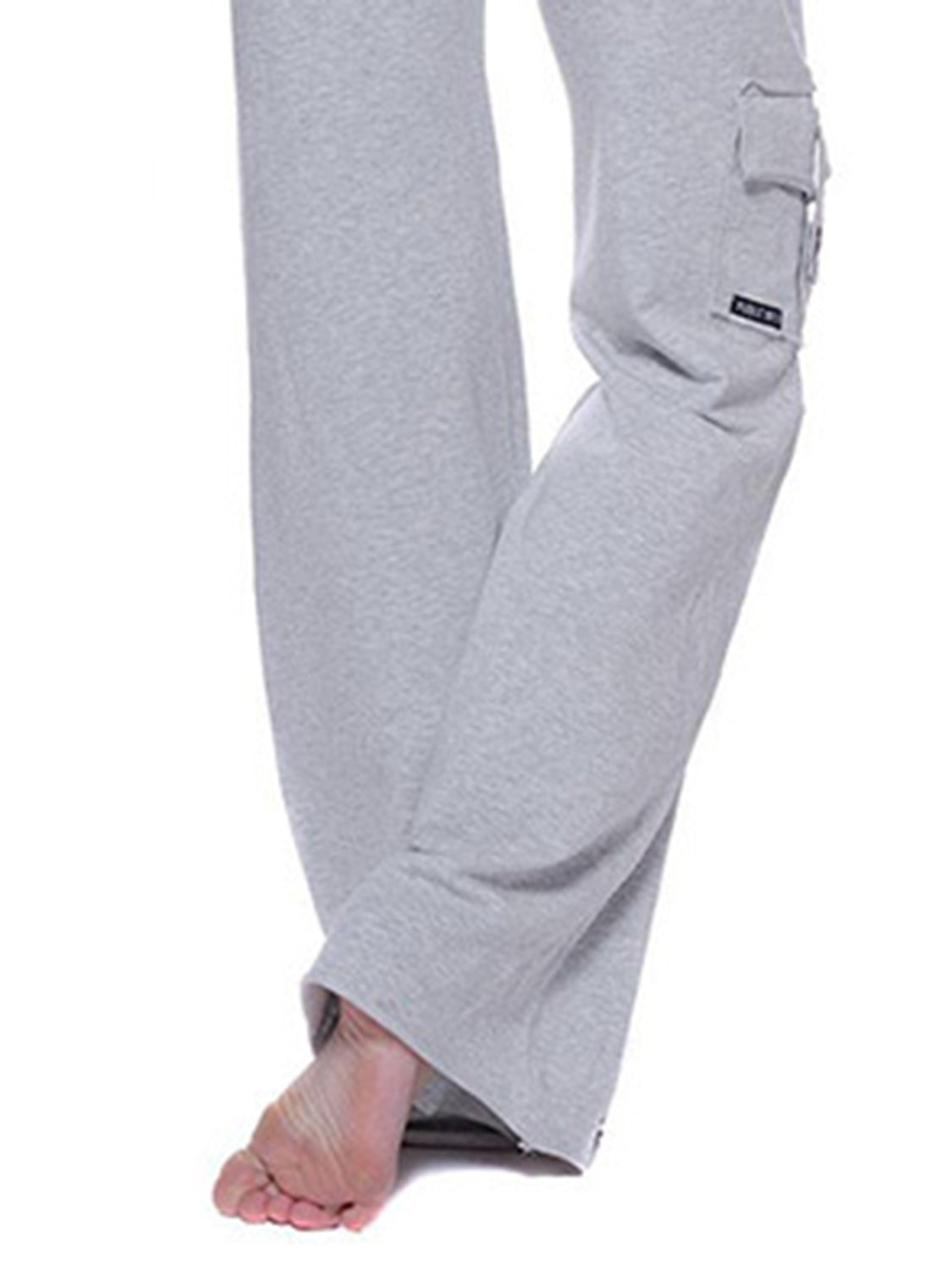 Mid waist pants with drawstring, buttons, and pockets, opaque.