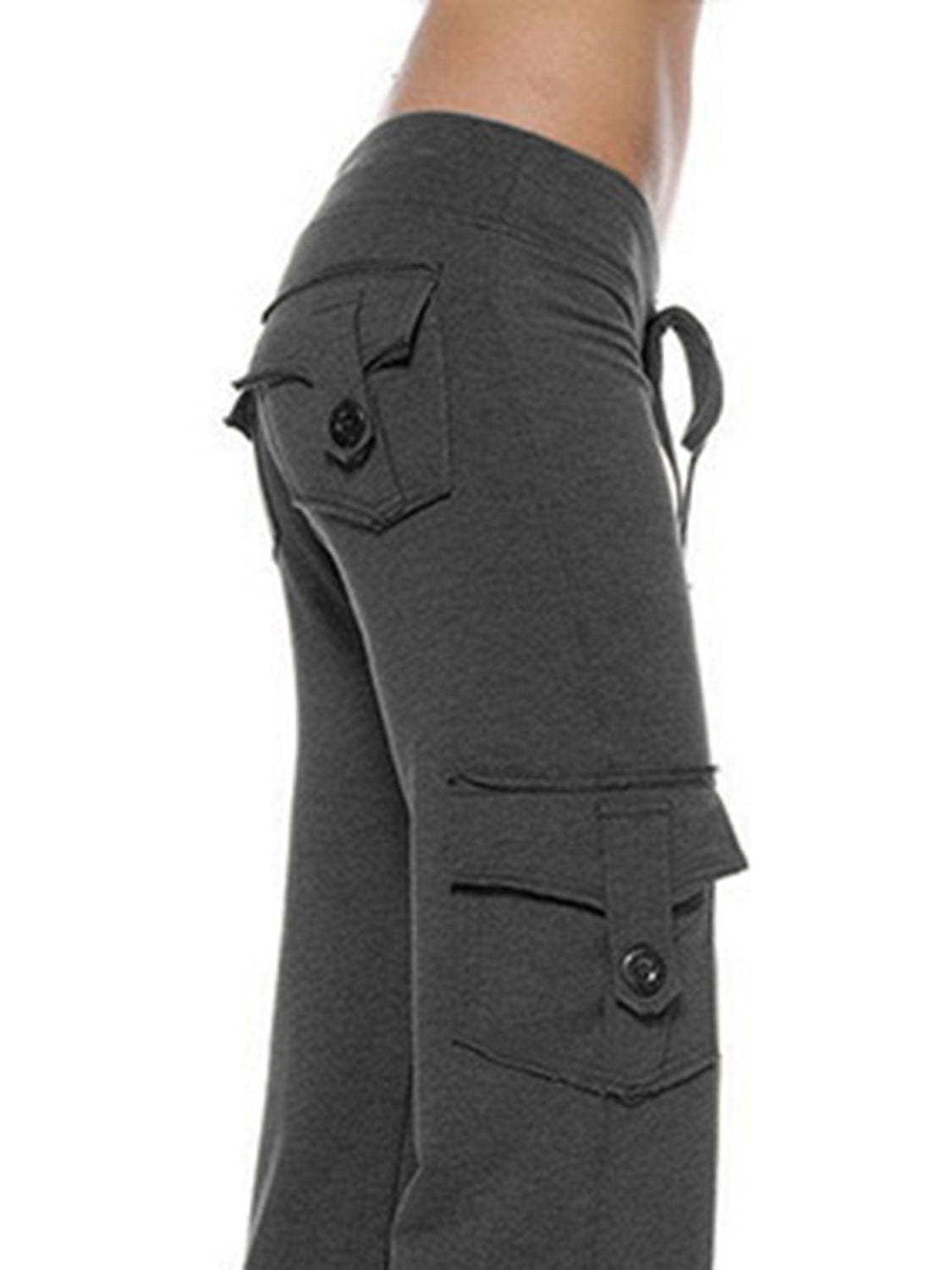 Mid waist pants with drawstring, buttons, and pockets, opaque.