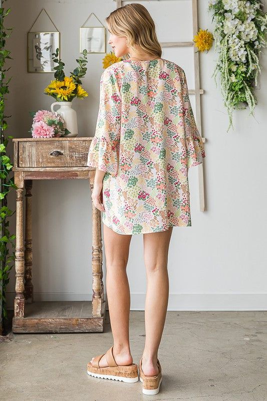 Plus size multi-color floral open cardigan with ruffled thin fabric.