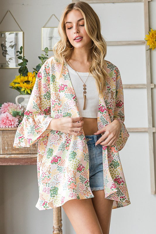 Plus size multi-color floral open cardigan with ruffled thin fabric.