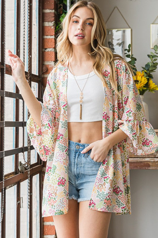 Plus size multi-color floral open cardigan with ruffled thin fabric.