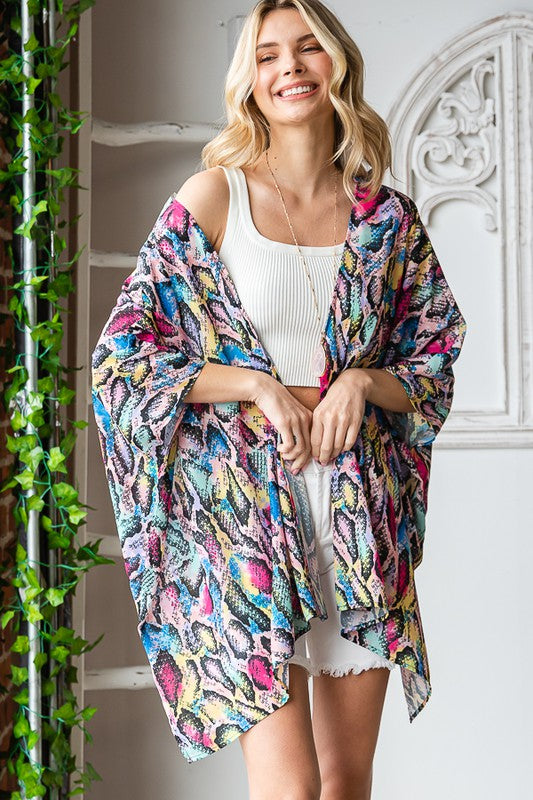Plus size multi-color snake print open cardigan with side slit.