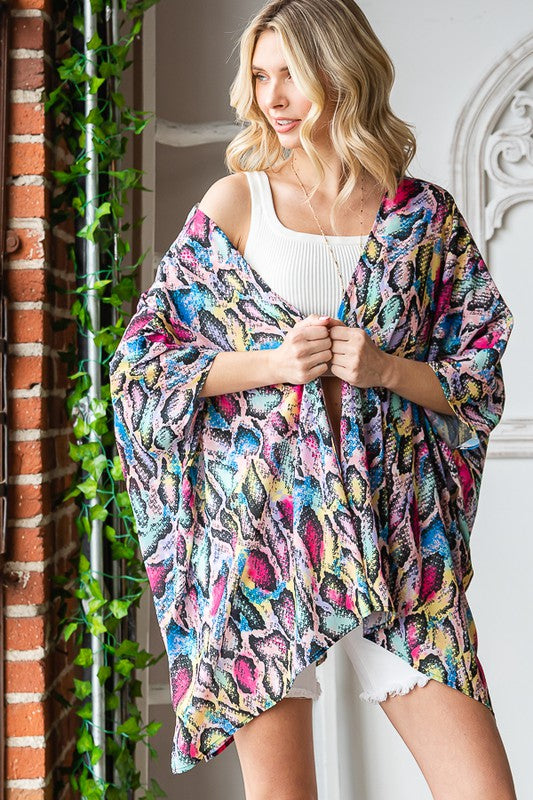 Plus size multi-color snake print open cardigan with side slit.