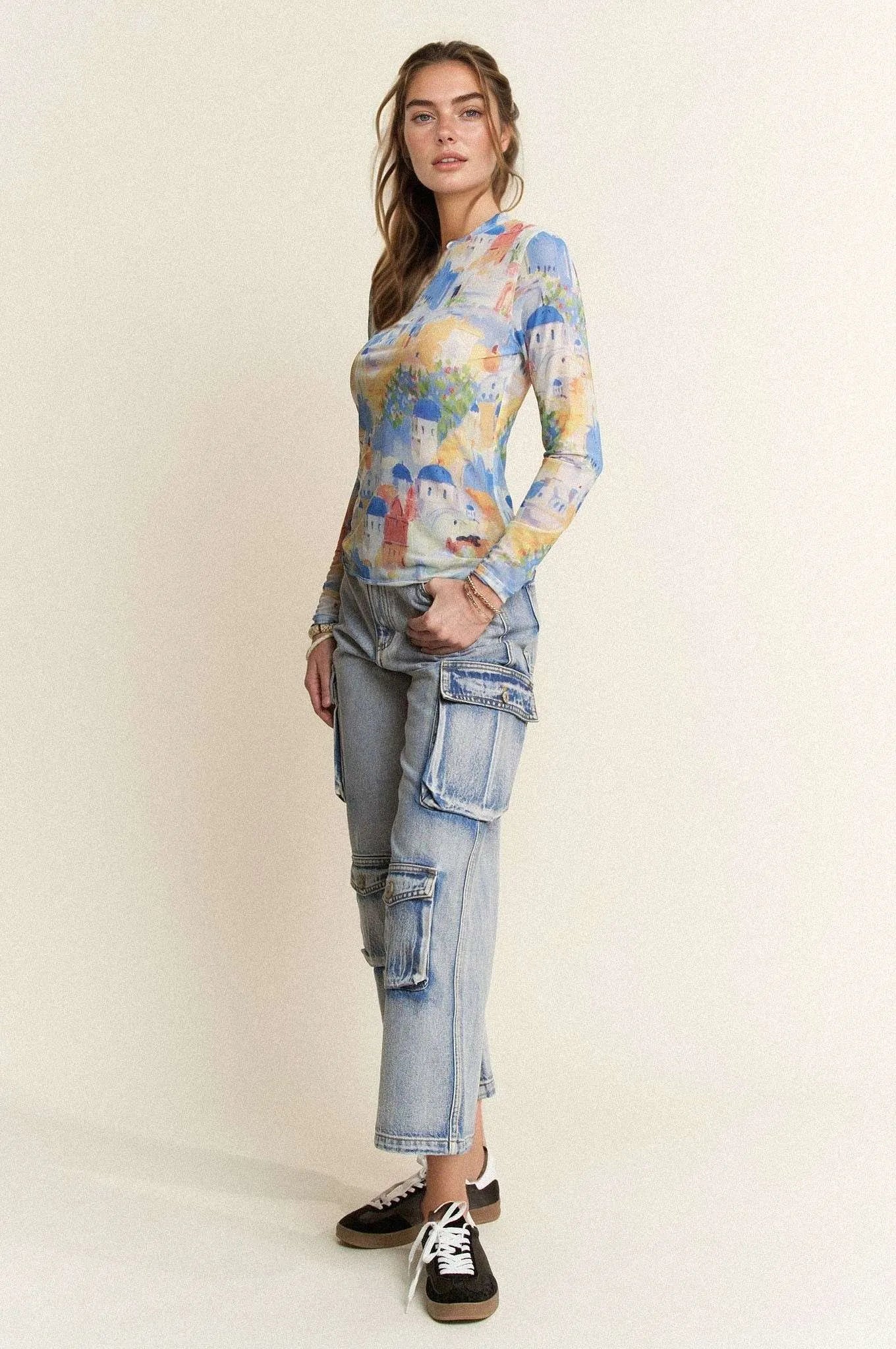 Davi Dani Multi Printed Mesh Round Neck Long Sleeve Top.