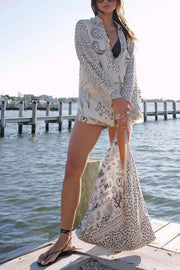 nautical print top and shorts set, coastal chic women's outfit, stylish two-piece set, marine-inspired design, comfortable summer wear, perfect for beach or boat outings