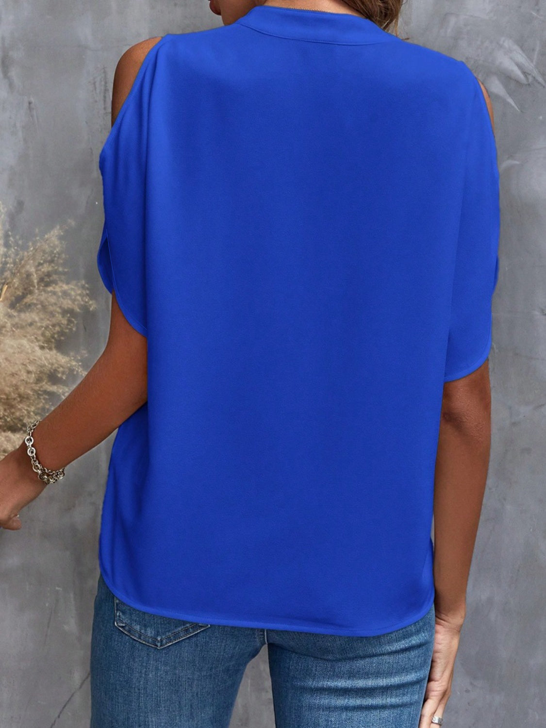 Notched Cold Shoulder Blouse.