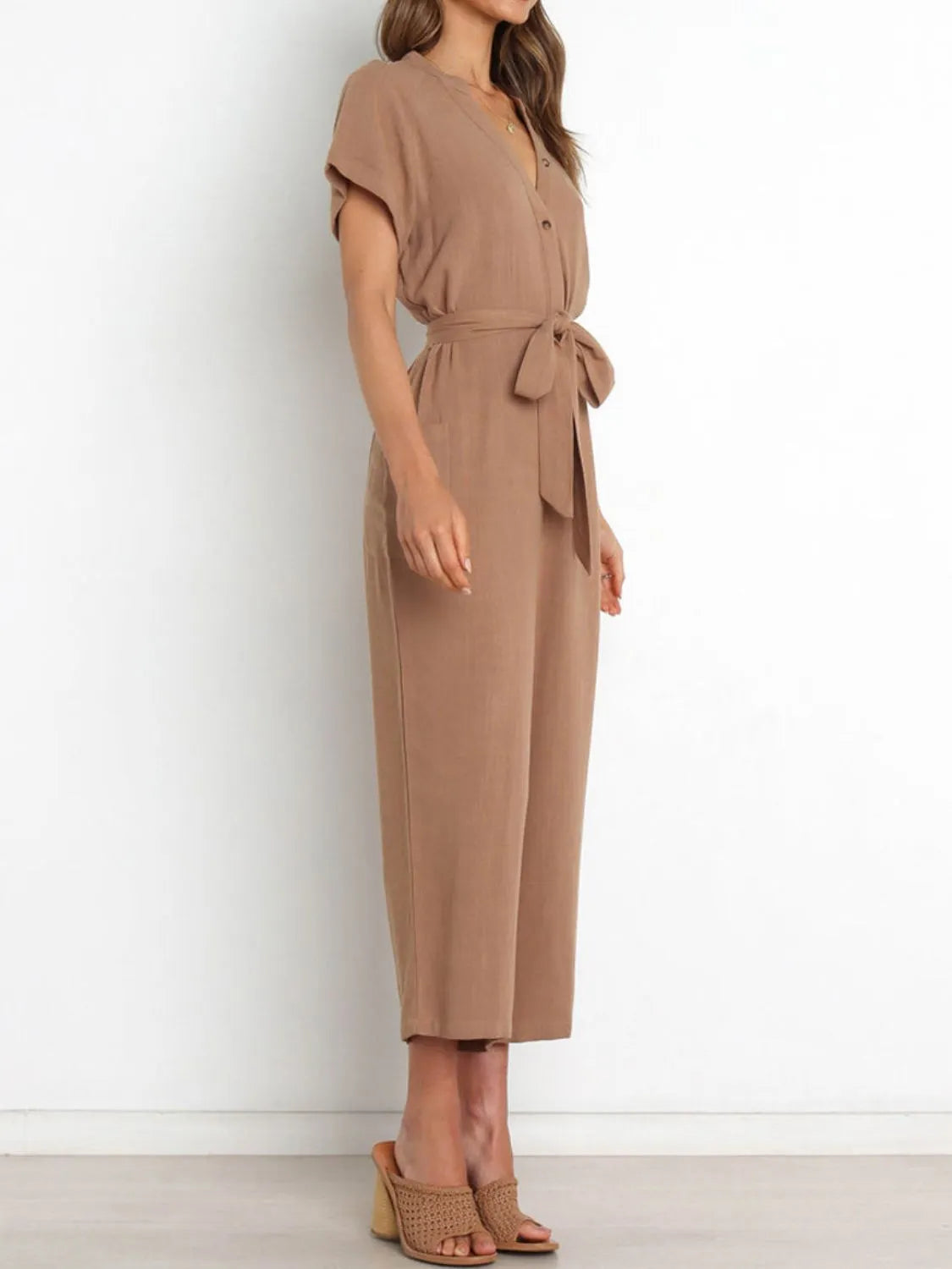 Notched Short Sleeve Tie Waist Jumpsuit with Buttons and Pockets.