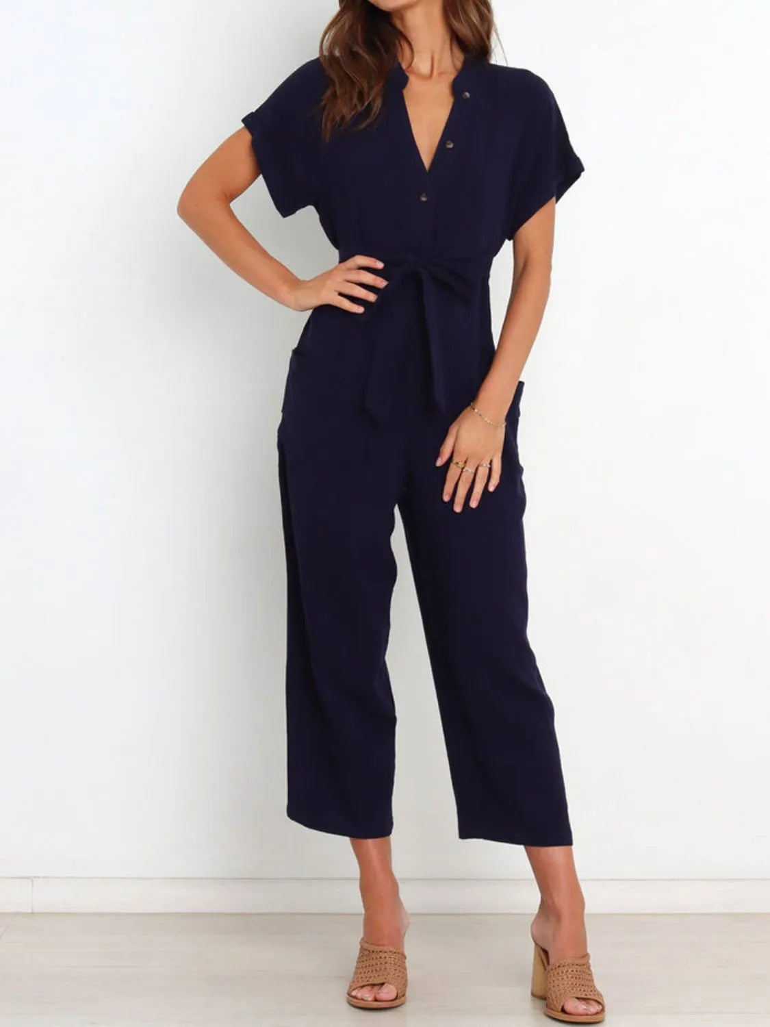 Notched Short Sleeve Tie Waist Jumpsuit with Buttons and Pockets.