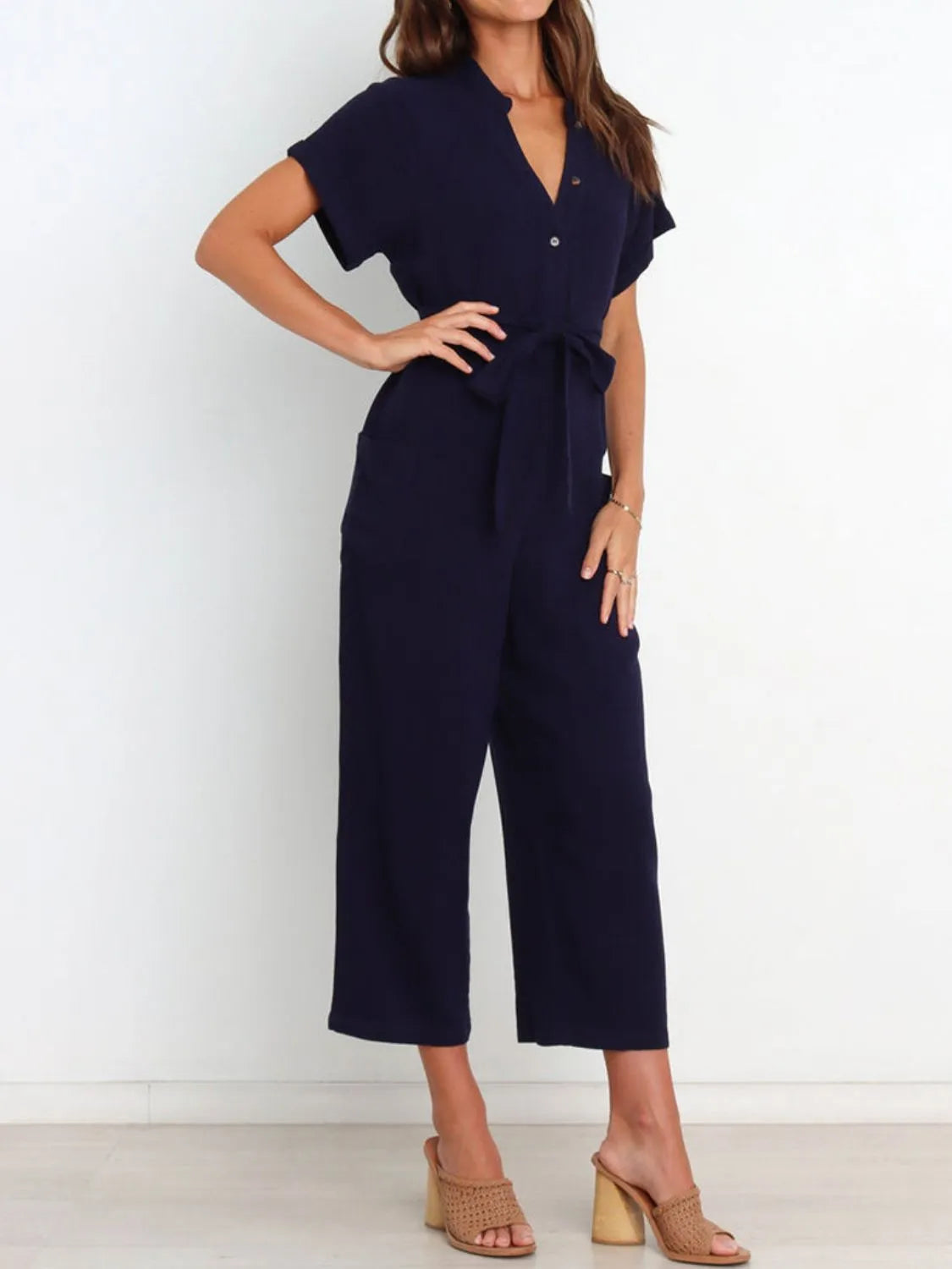 Notched Short Sleeve Tie Waist Jumpsuit with Buttons and Pockets.