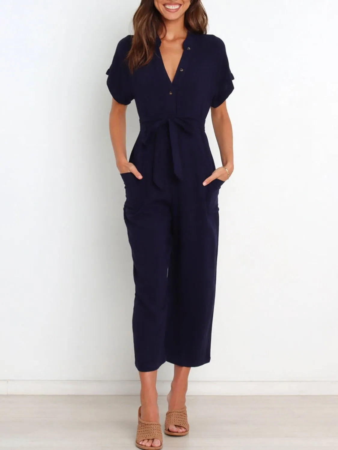 Notched Short Sleeve Tie Waist Jumpsuit with Buttons and Pockets.