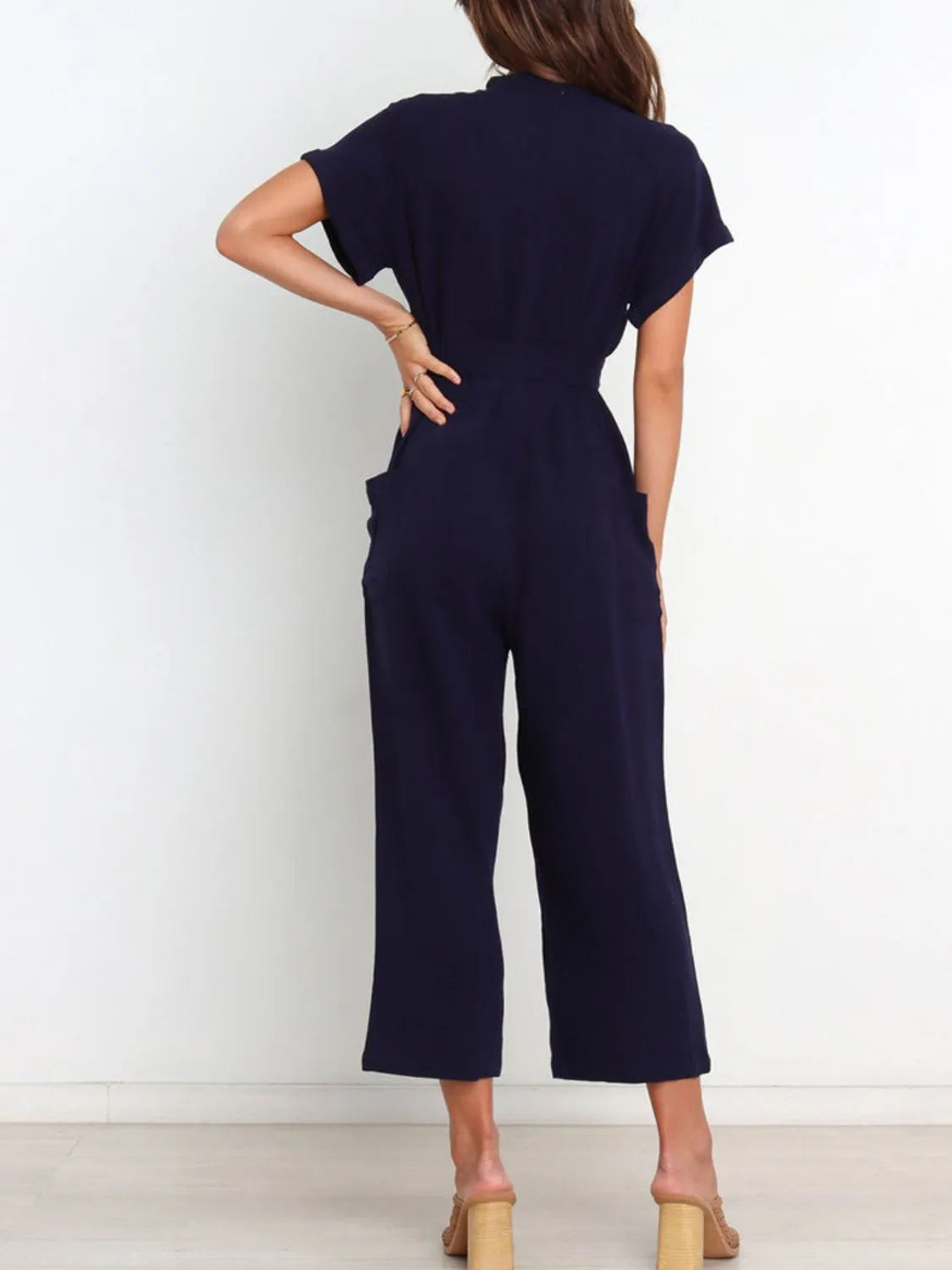 Notched Short Sleeve Tie Waist Jumpsuit with Buttons and Pockets.