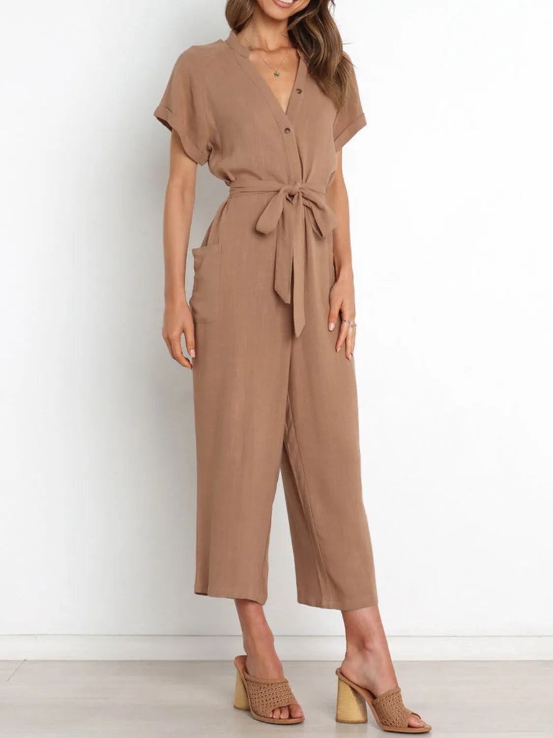 Notched Short Sleeve Tie Waist Jumpsuit with Buttons and Pockets.