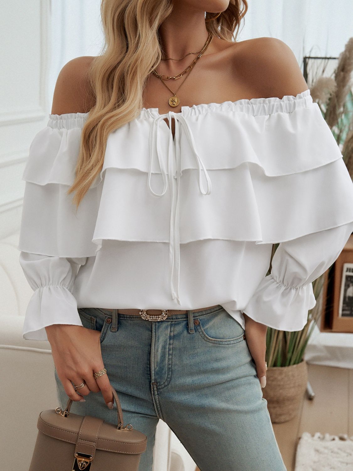 Devine Off-Shoulder Flounce Sleeve Blouse.