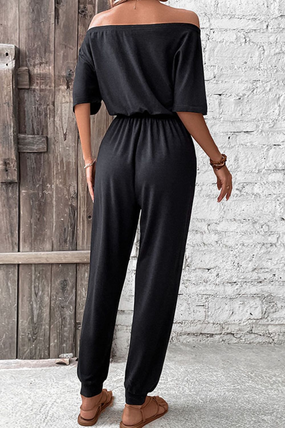 Off-Shoulder Jumpsuit with Pockets and Tie.