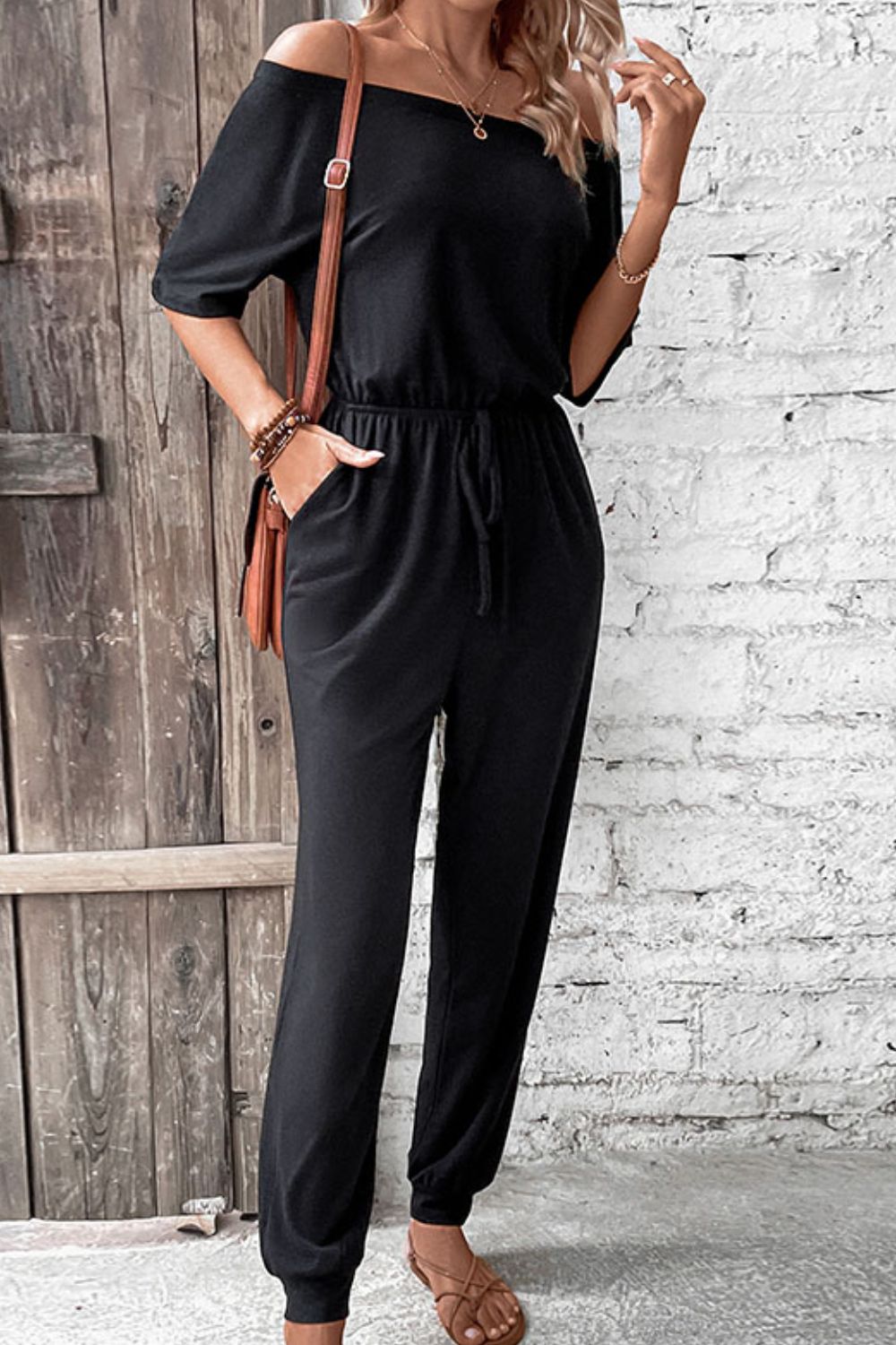 Off-Shoulder Jumpsuit with Pockets and Tie.