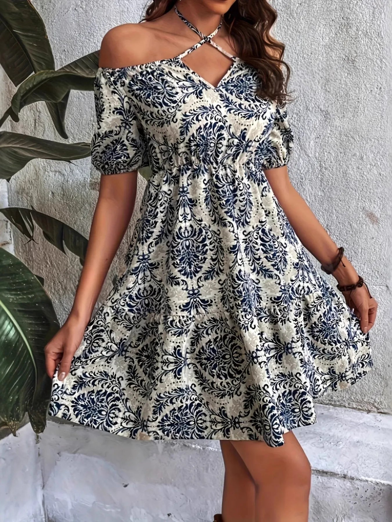 Off-Shoulder Printed Smocked Mini Dress.
