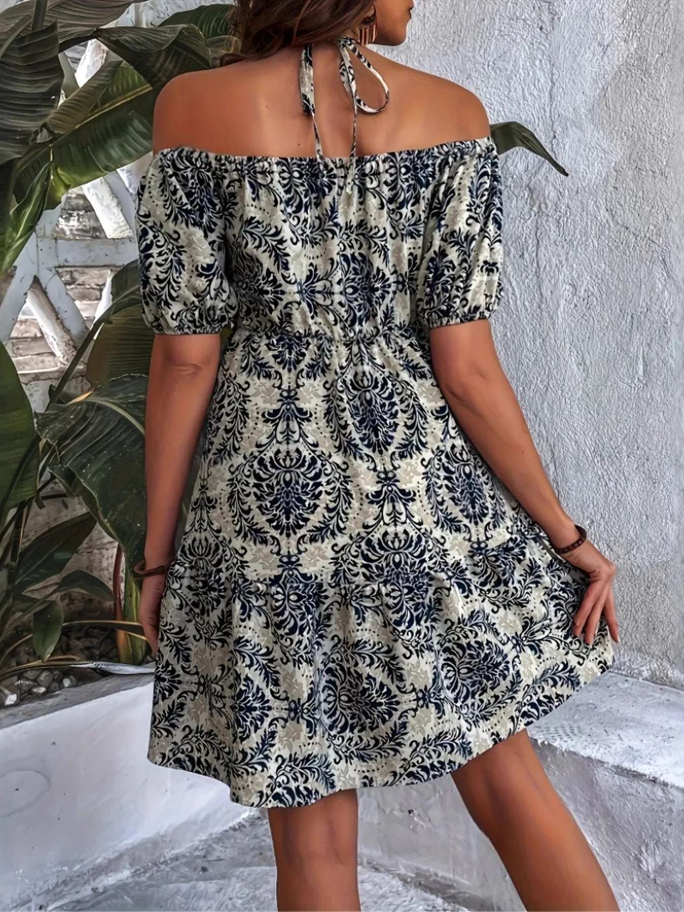 Off-Shoulder Printed Smocked Mini Dress.