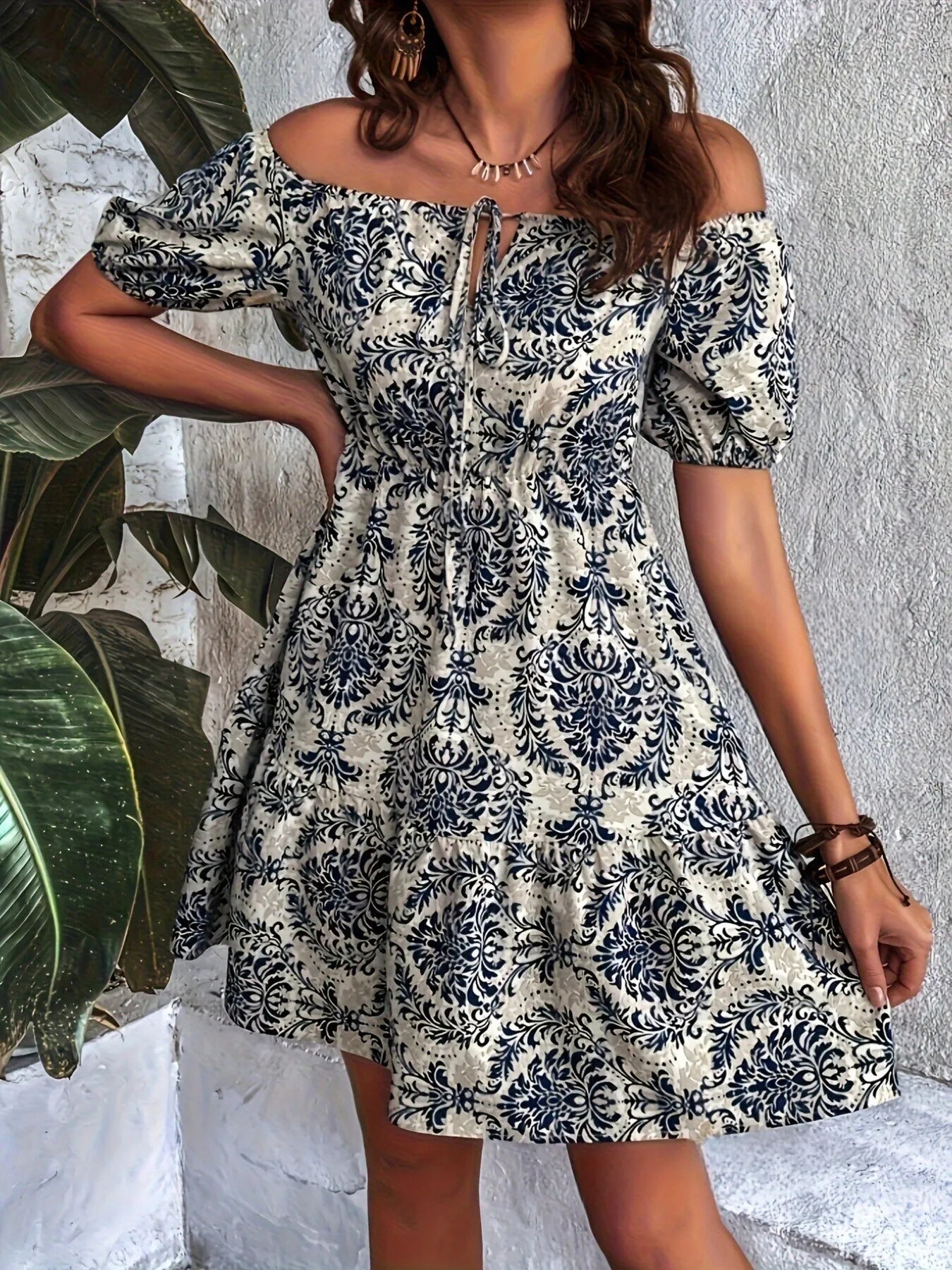 Off-Shoulder Printed Smocked Mini Dress.