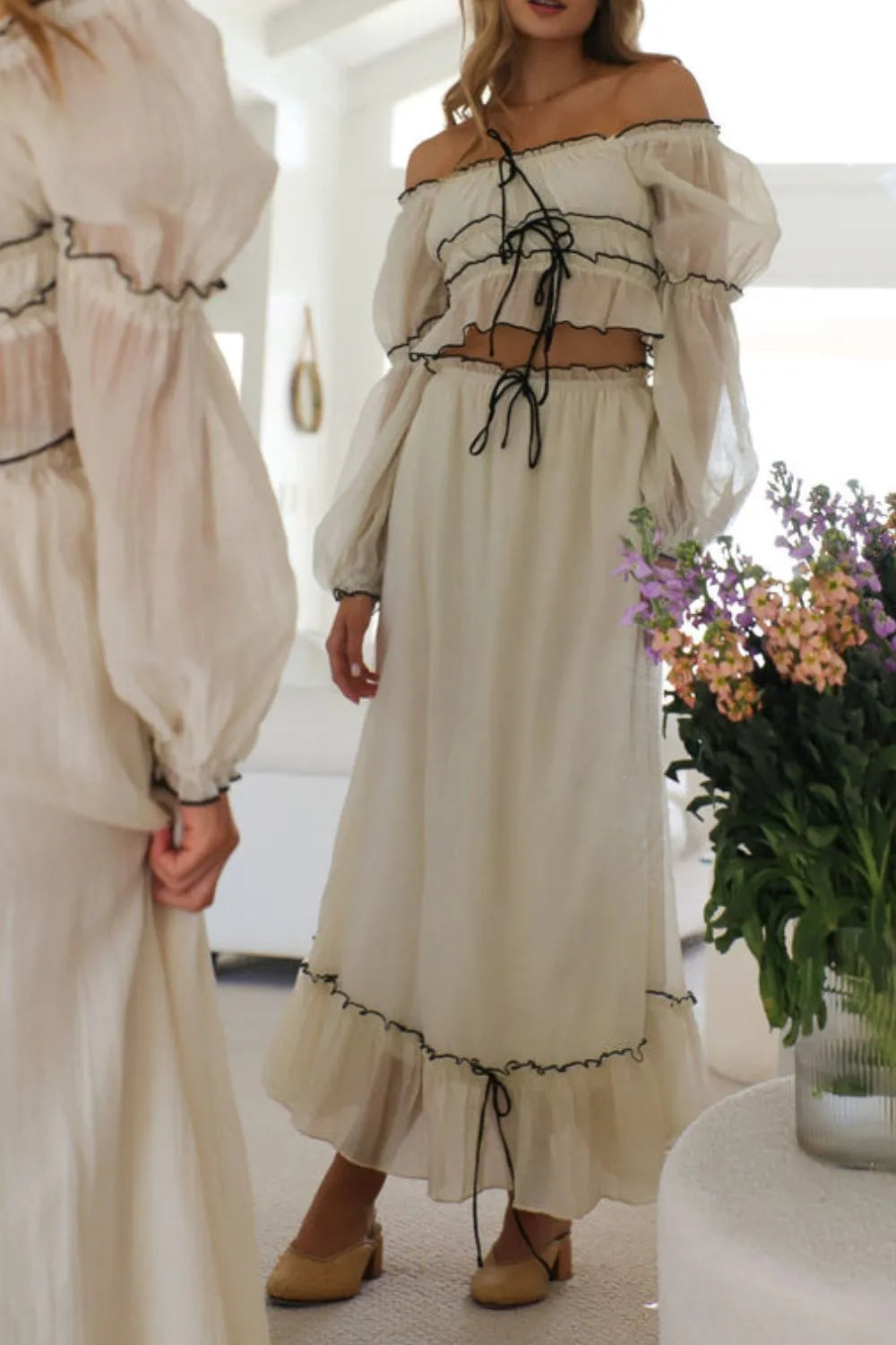 Off-Shoulder Top and Skirt Set.