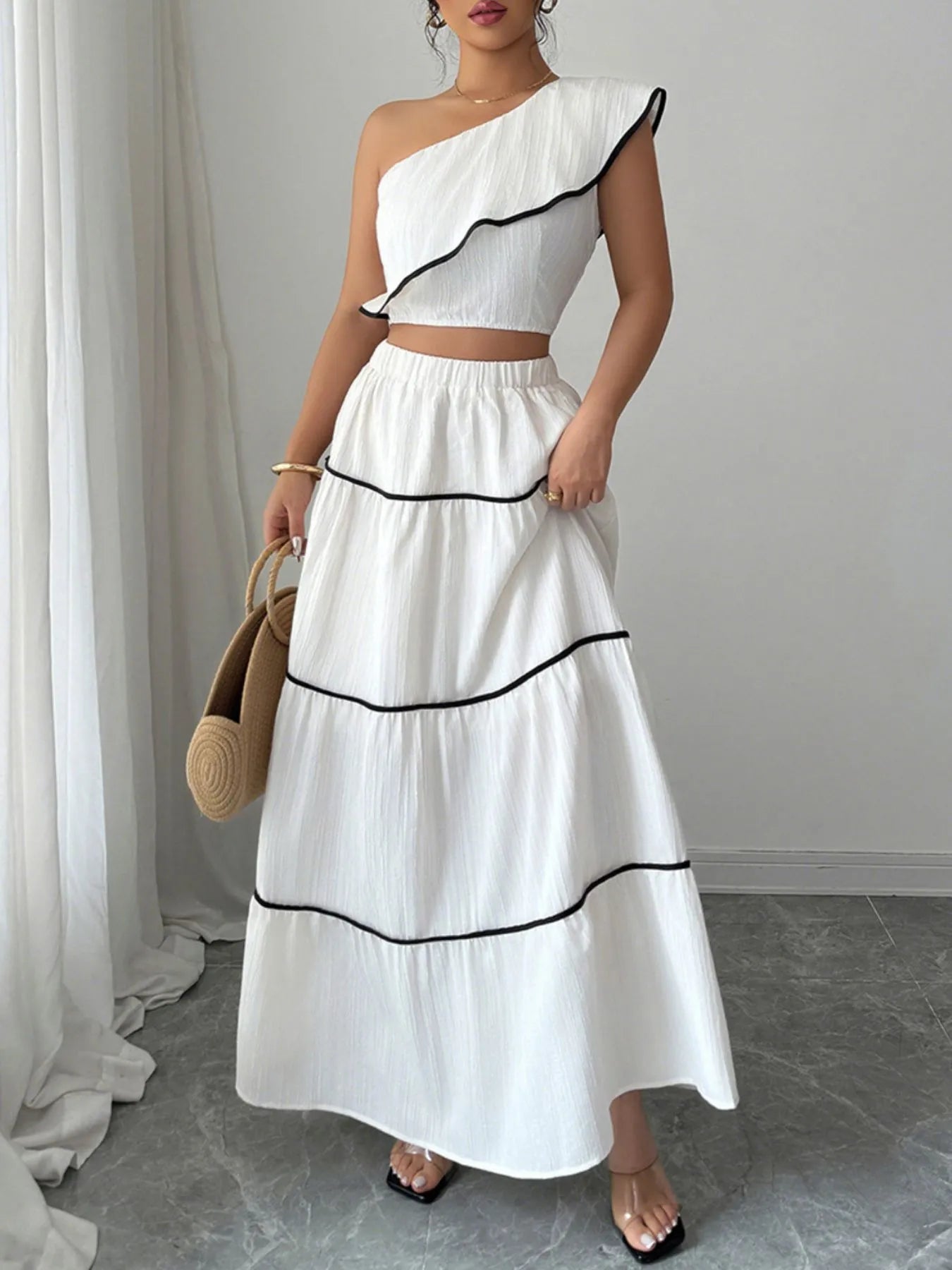 One-Shoulder Ruffle Top and Skirt Two-Piece Set.