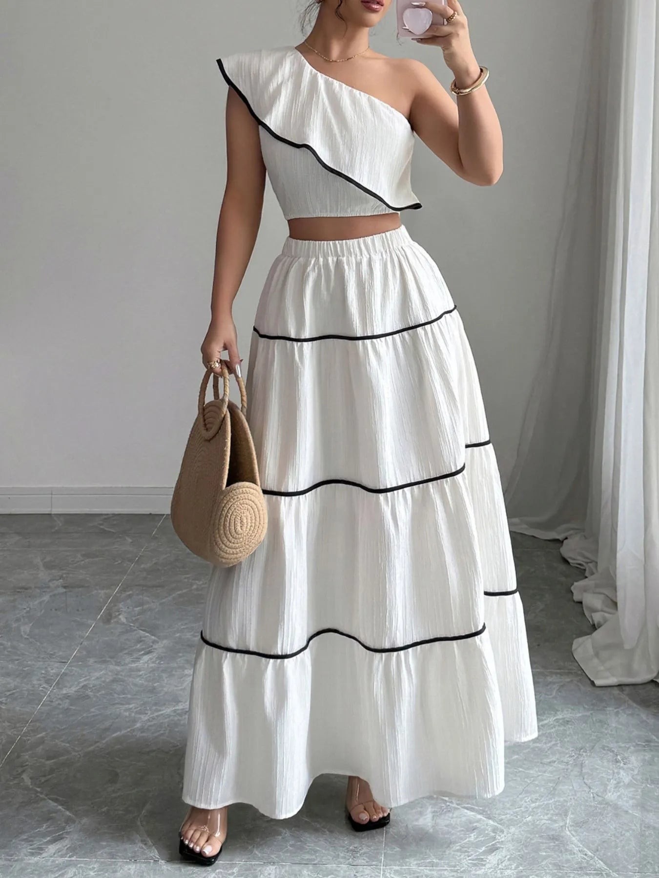 One-Shoulder Ruffle Top and Skirt Two-Piece Set.