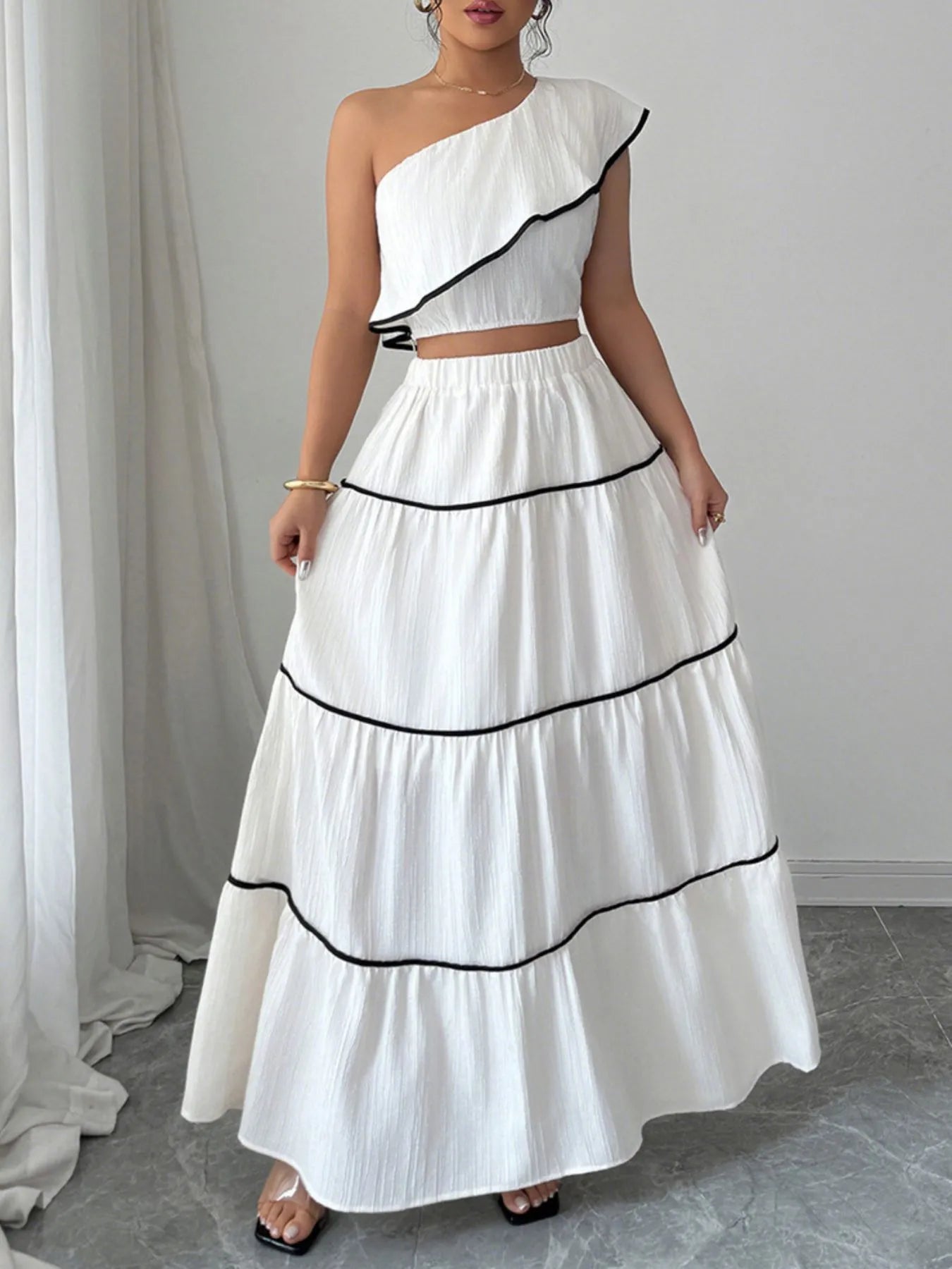 One-Shoulder Ruffle Top and Skirt Two-Piece Set.