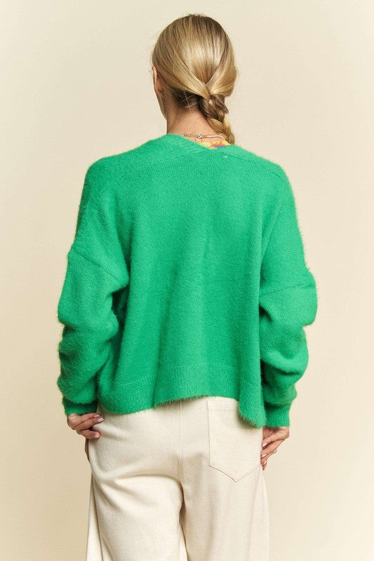 Open front drop shoulder cardigan with ribbed details and pockets.
