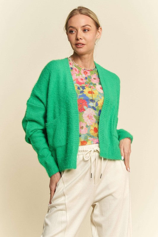 Open front drop shoulder cardigan with ribbed details and pockets.
