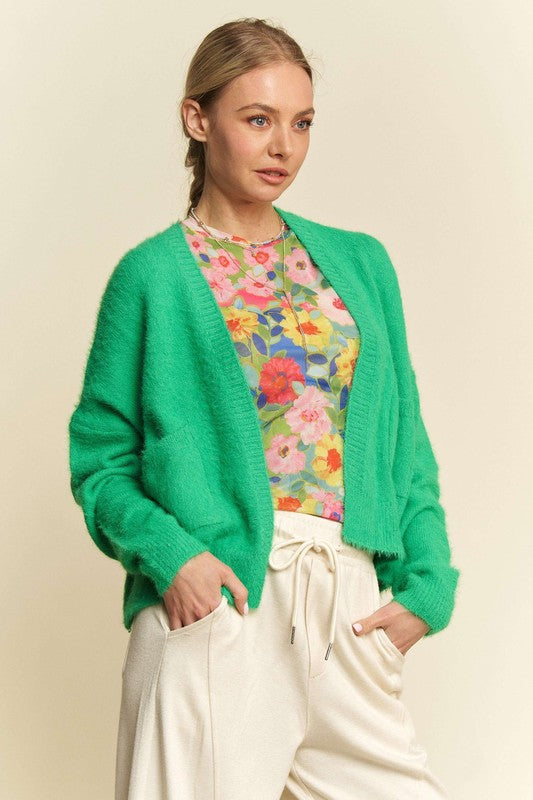 Open front drop shoulder cardigan with ribbed details and pockets.