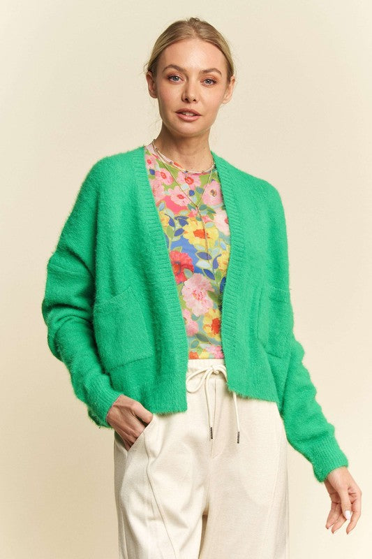 Open front drop shoulder cardigan with ribbed details and pockets.