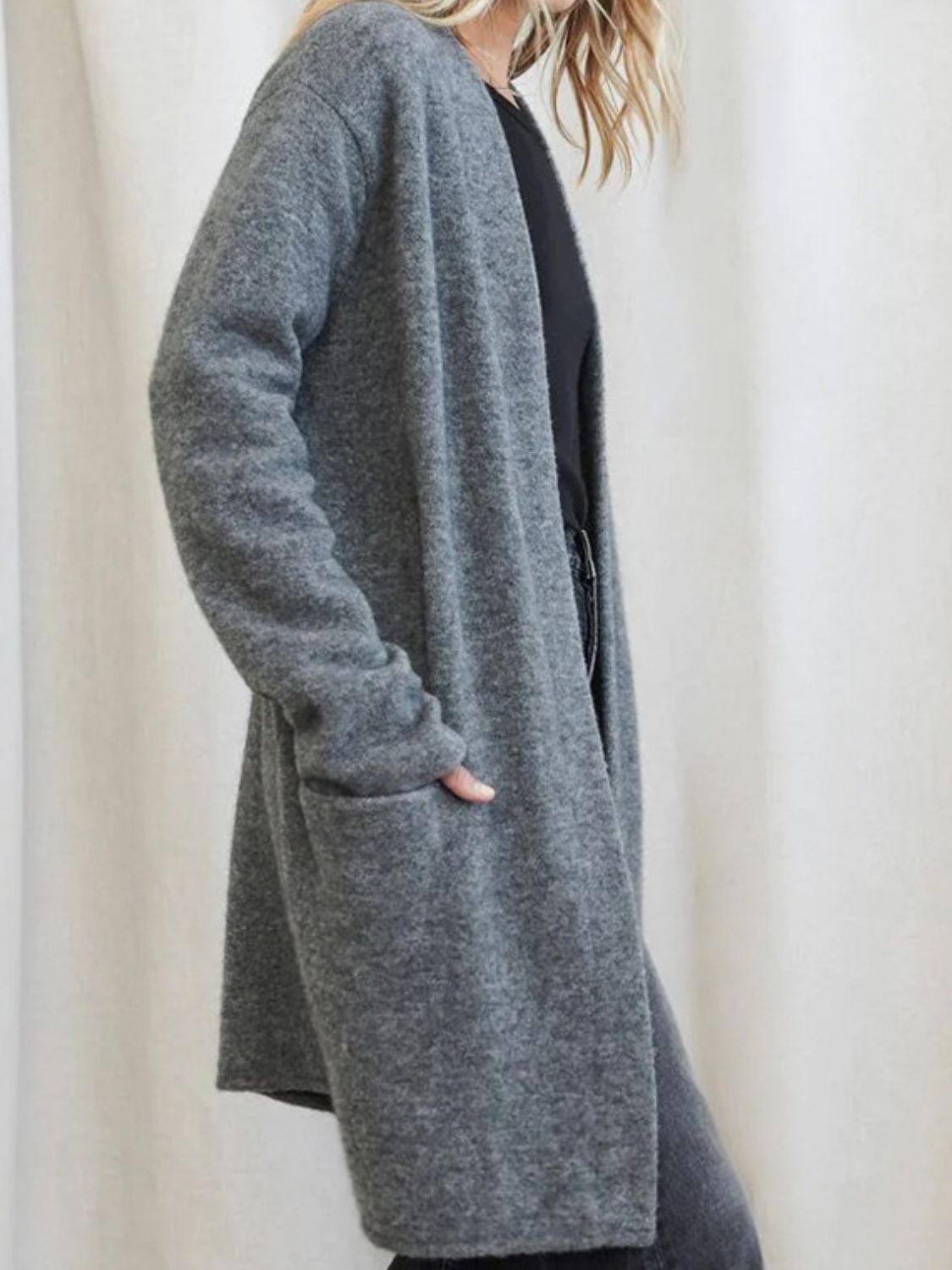Open front long sleeve cardigan with pockets.