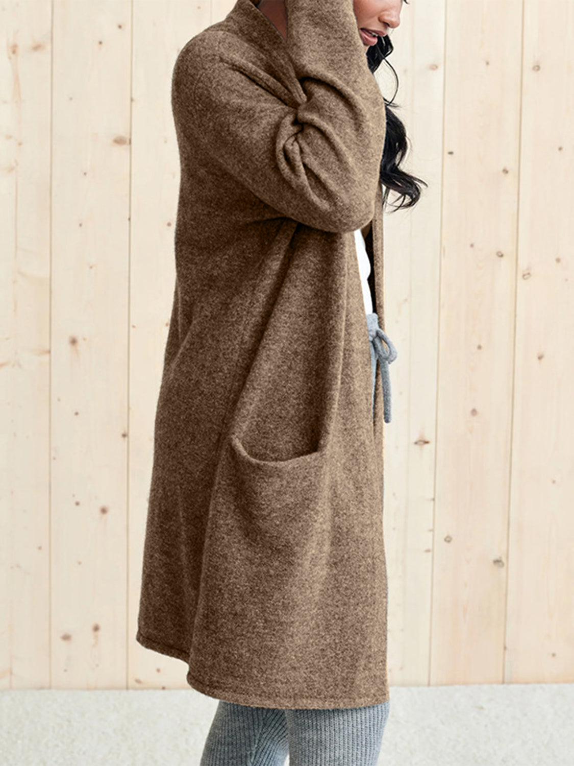 Open front long sleeve cardigan with pockets.