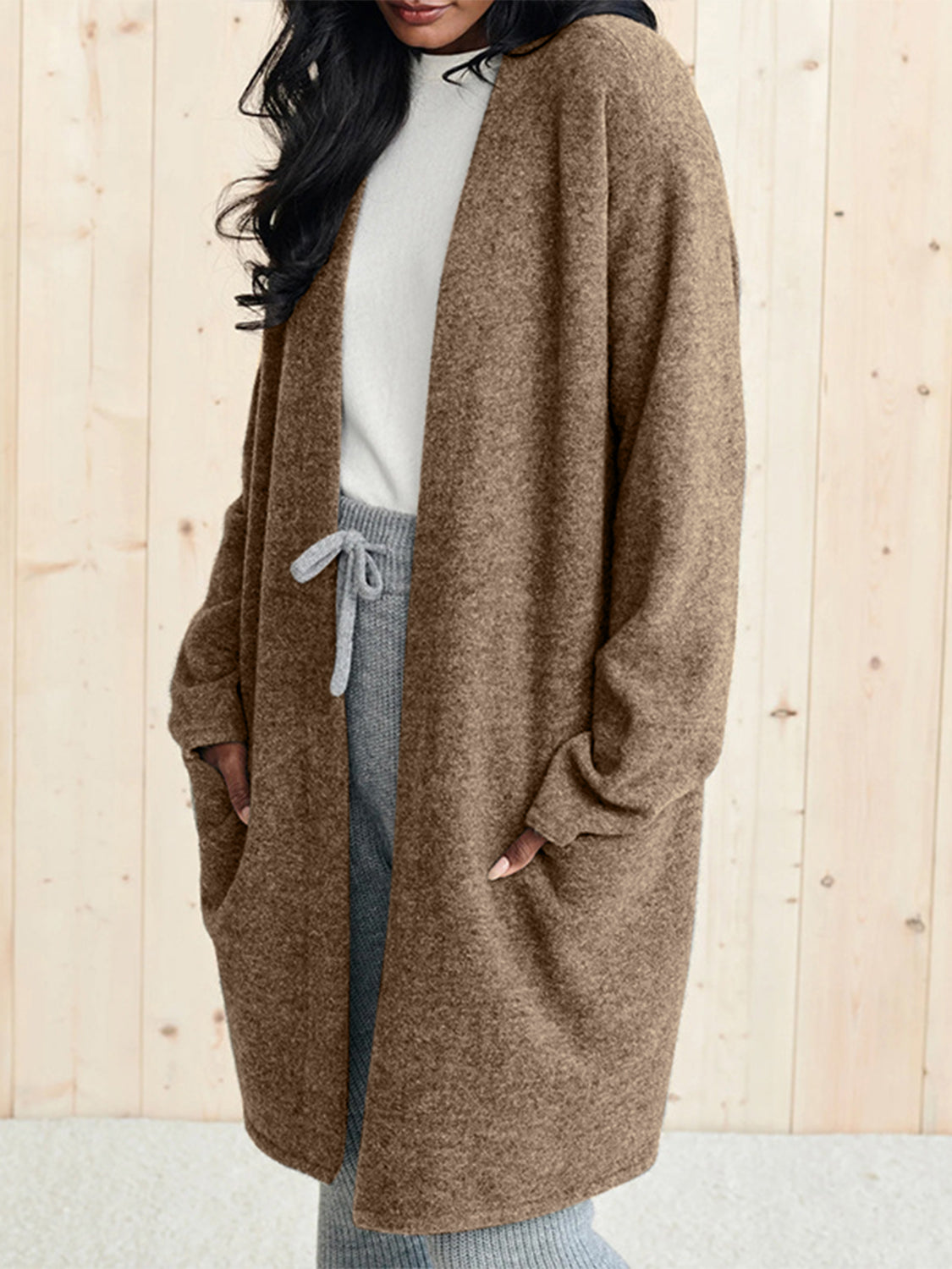 Open front long sleeve cardigan with pockets.