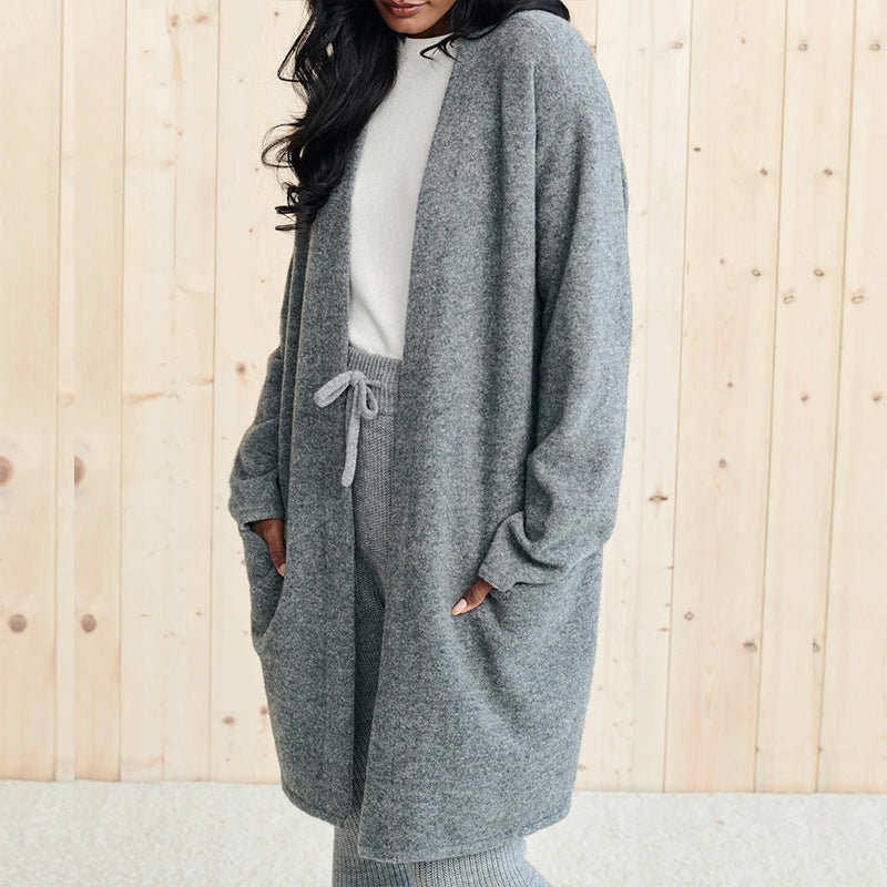 Open front long sleeve cardigan with pockets.