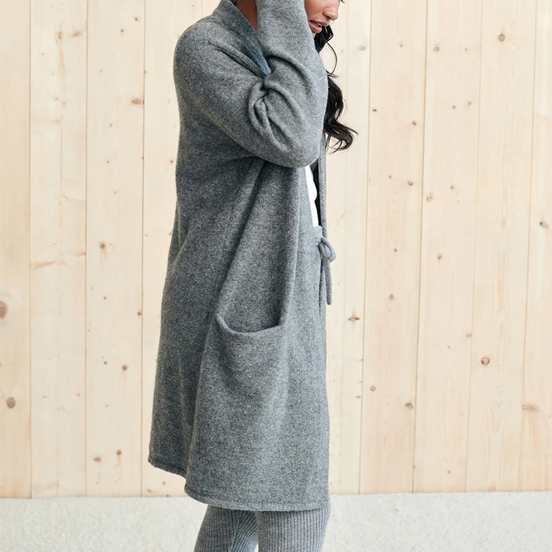 Open front long sleeve cardigan with pockets.