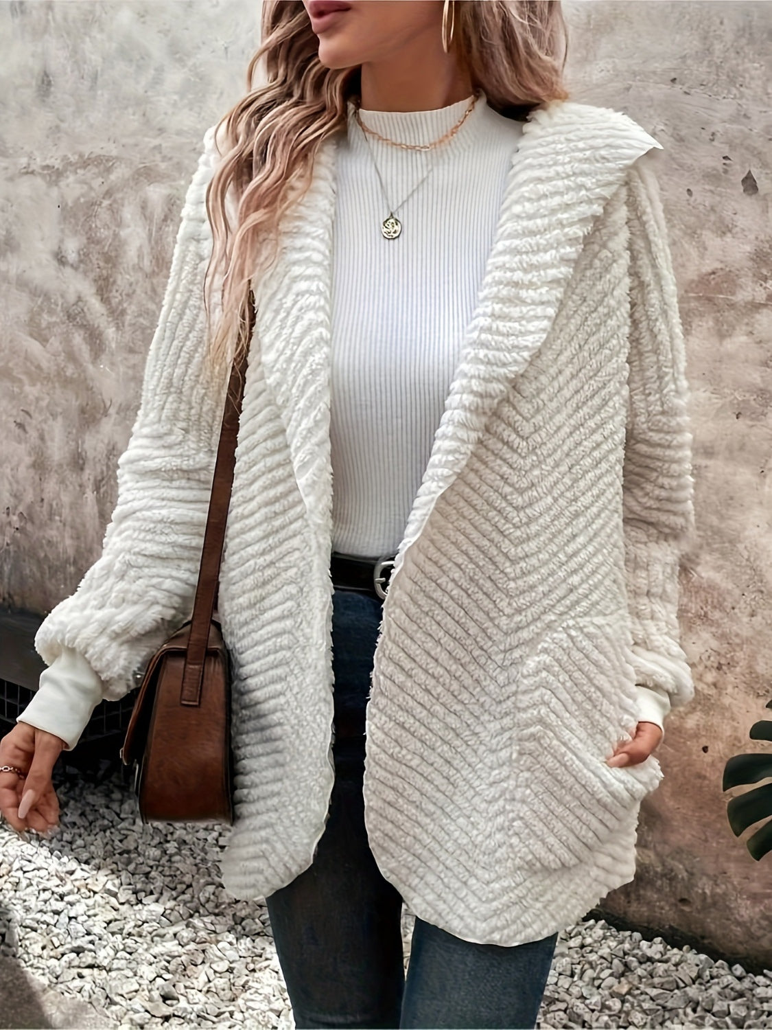 Open front long sleeve hooded fuzzy cardigan.