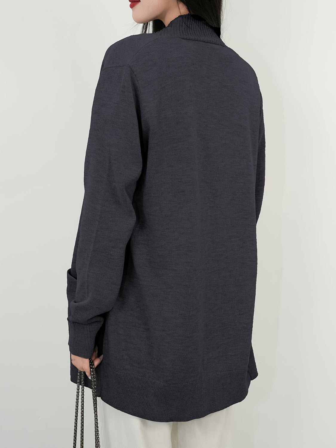 Open front long sleeve sweater cardigan with pockets.