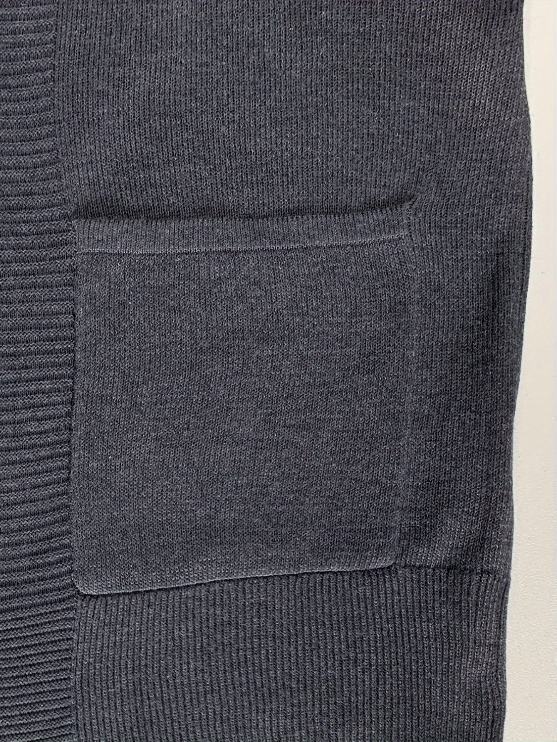 Open front long sleeve sweater cardigan with pockets.