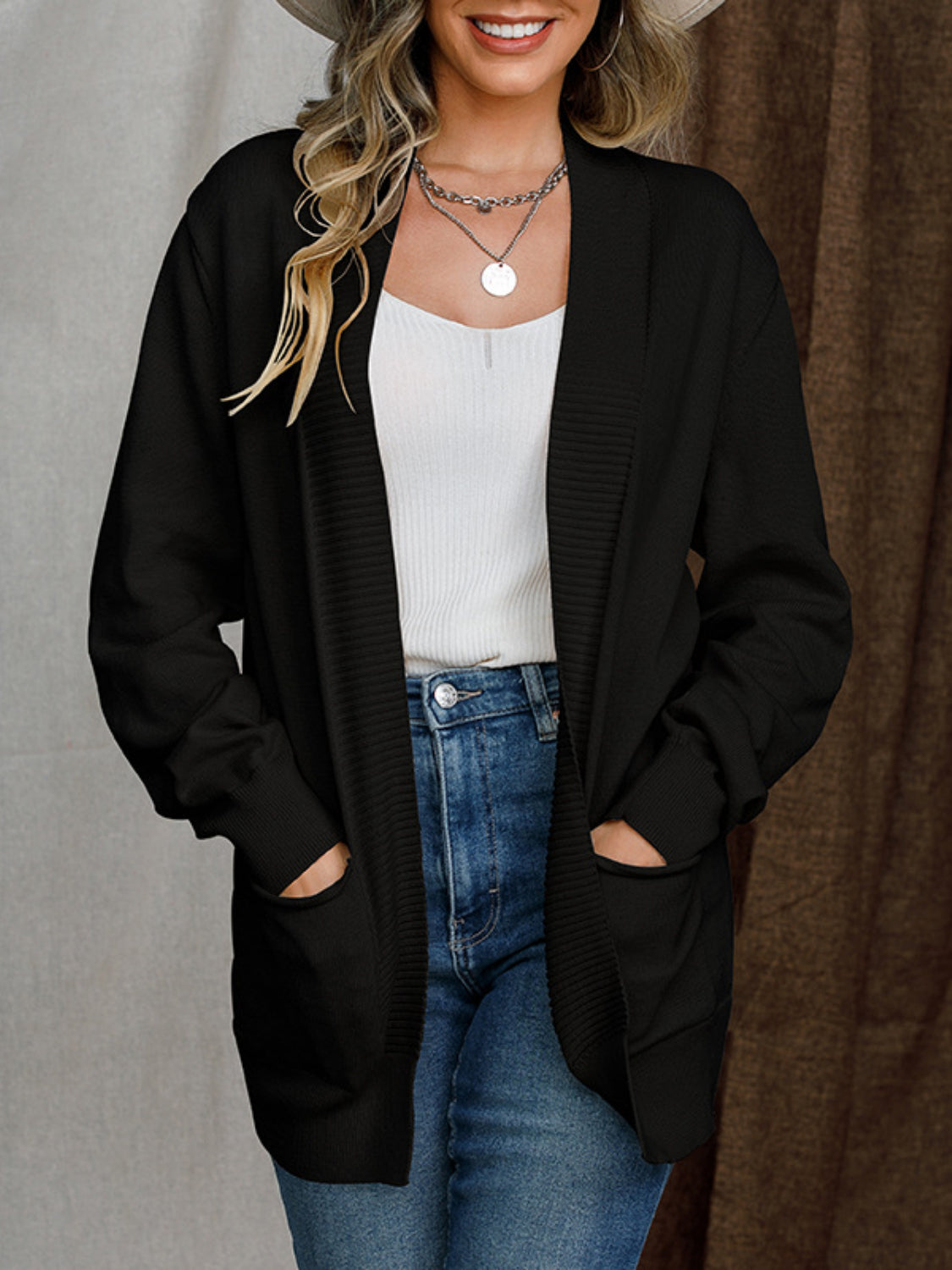 Open front long sleeve sweater cardigan with pockets.