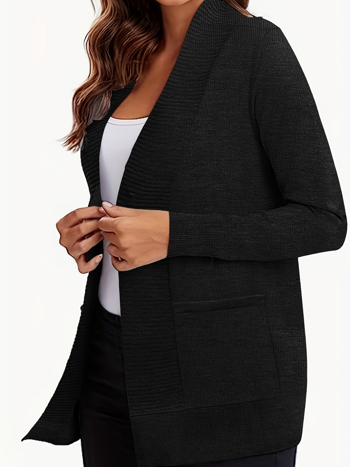 Open front long sleeve sweater cardigan with pockets.